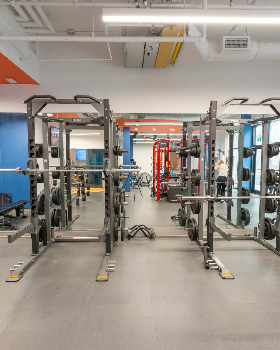 Squat racks and free-weight area at Fuse Fitness Studio Calgary